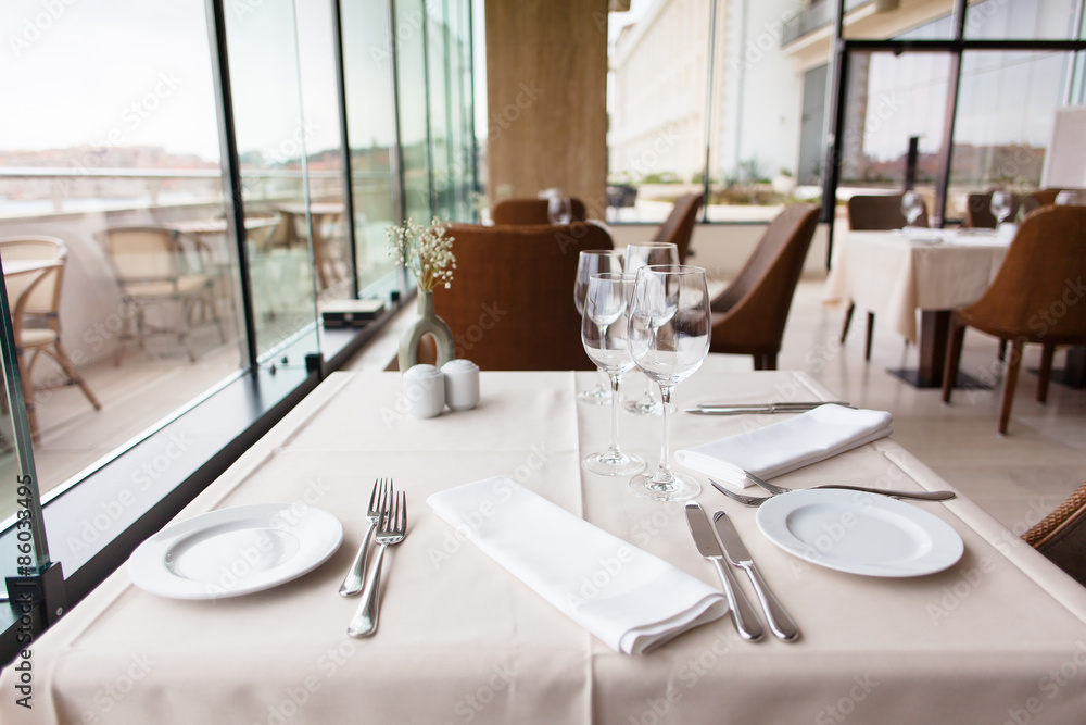 restaurant table setting by the window restaurant table setting by the window