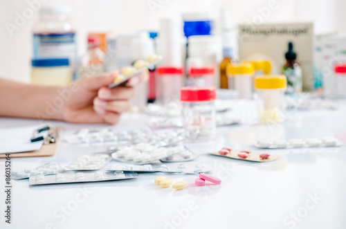 close up of pills with other medicines on background