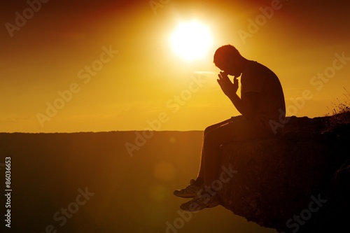 Praying, Depression, Sadness. photo