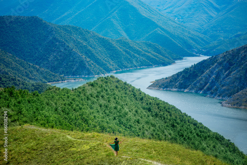 Woman walking on the mountains