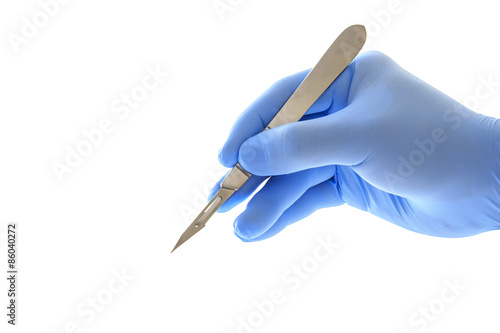 Photo Doctor's hand holding a scalpel