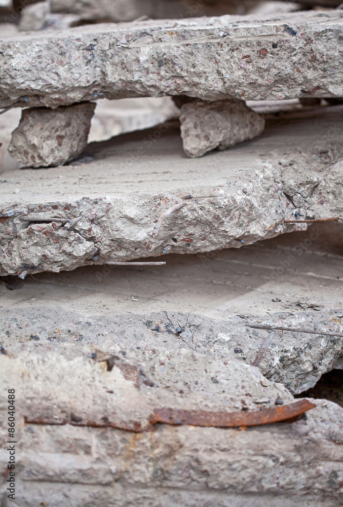 Obraz premium Close-up photo of a pile broken concrete blocks