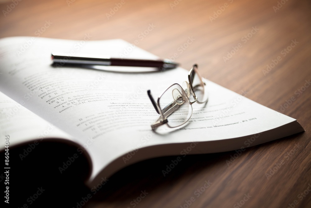 Glasses, Book, Report. Glasses, Book, Report.