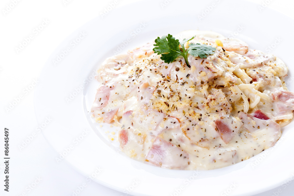 Pasta carbonara with bacon on white background Pasta carbonara with bacon on white background