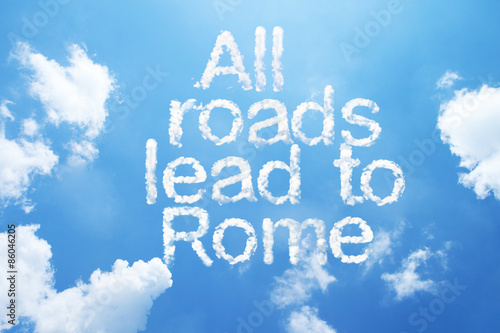All roads lead to Rome a cloud word on sky.