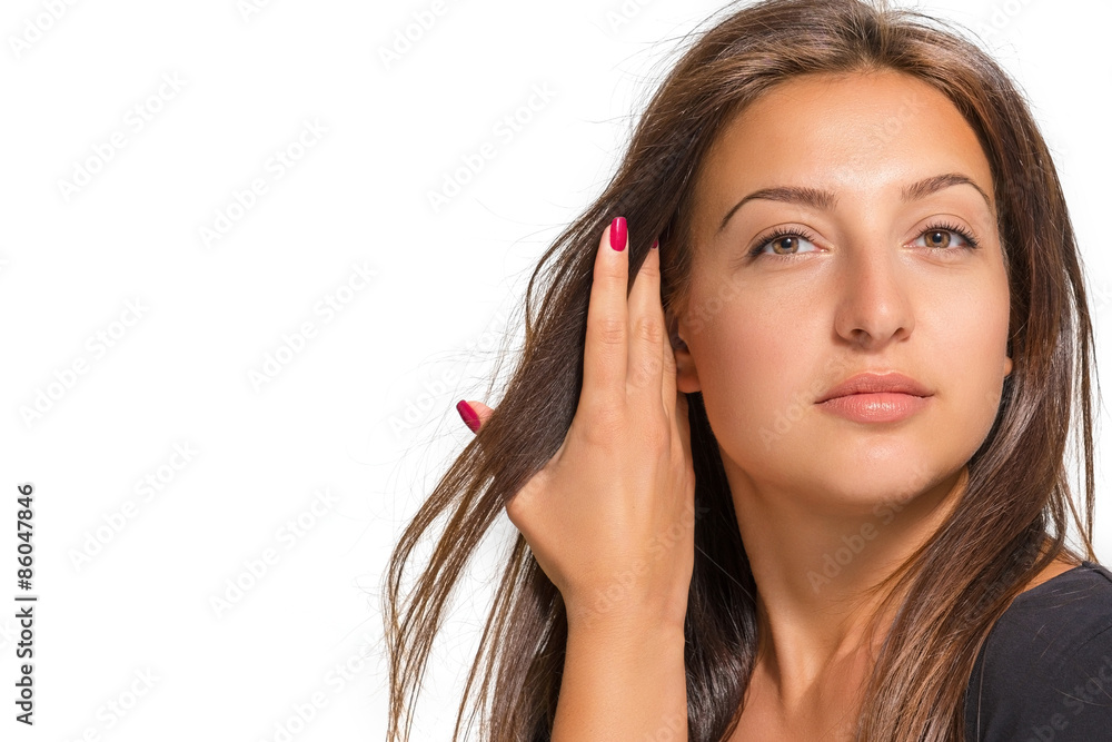 Portrait of a beautiful young woman on a white background Portrait of a beautiful young woman on a white background