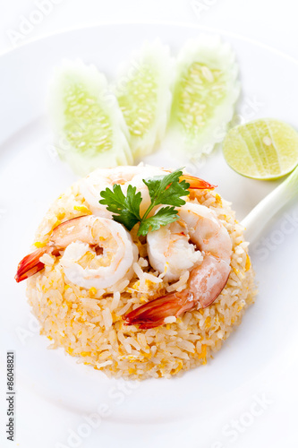 Fried rice with shrimp and vegetables on white plate, Thai cuisine