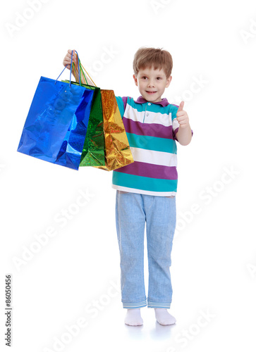 Cheerful little boy to do some shopping