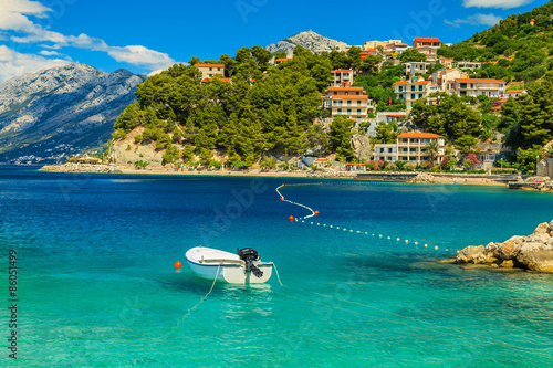 Beautiful coastline and beach with motorboat,Brela,Dalmatia region,Croatia,Europe photo