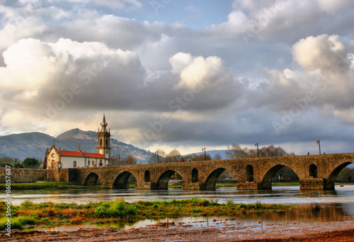 Roman and medieval bridge of Ponte de Lima in Portugal photo