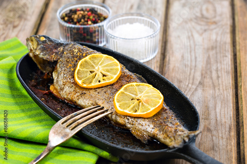 Delicious baked rainbow trout with lemon straight from the oven