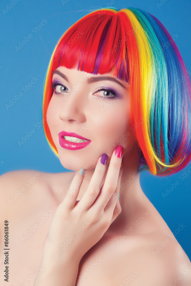 Fototapeta premium beautiful woman wearing colorful wig