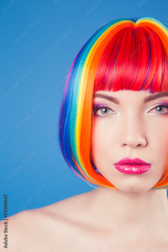 Fototapeta premium beautiful woman wearing colorful wig