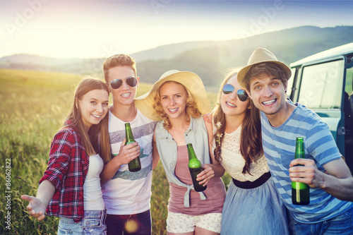 Young hipster friends on road trip