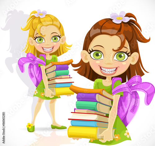 Cute little schoolgirl with a stack of books