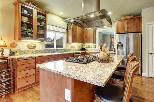 perfect kitchen with hardwood floor and island.