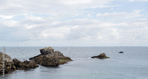view of the wild coast of a brittany island during summer