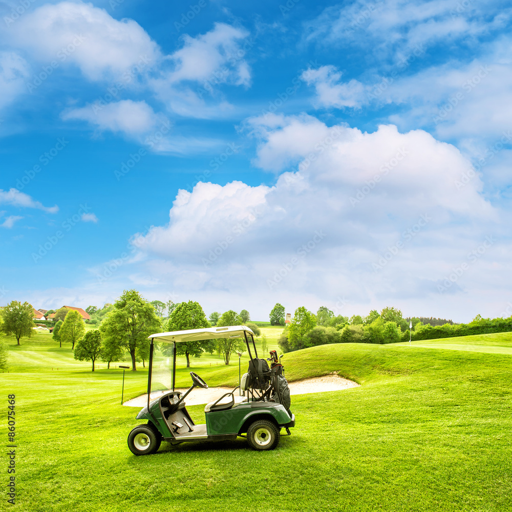 Golf course lanscape with green field over blue sky