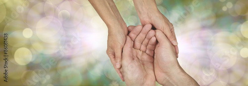 Canvas Print Compassion banner -  wide banner with a woman's hands holding a man's cupped han