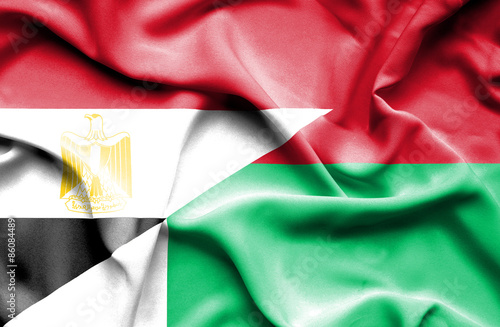 Waving flag of Madagascar and Egypt