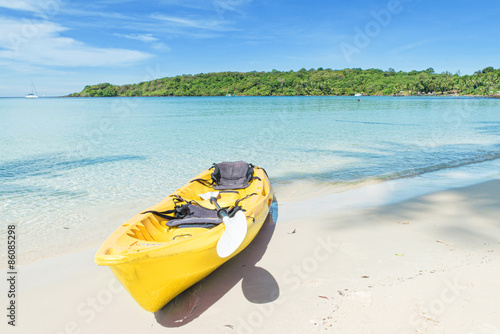 Summer, Travel, Vacation and Holiday concept - Yellow kayaks on