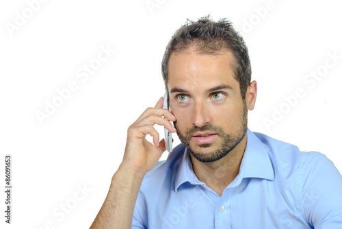 portrait of a young businessman on phone