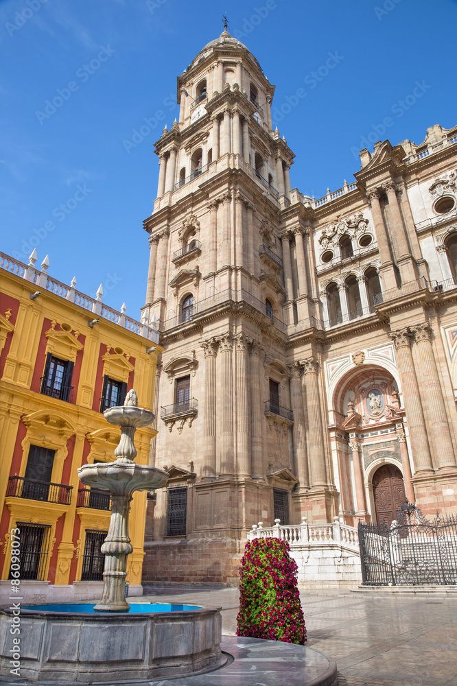 Malaga - Cathedral tower and fountain from Plaza del Obispo.