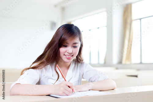 Asian beautiful female student study portrait in classroom