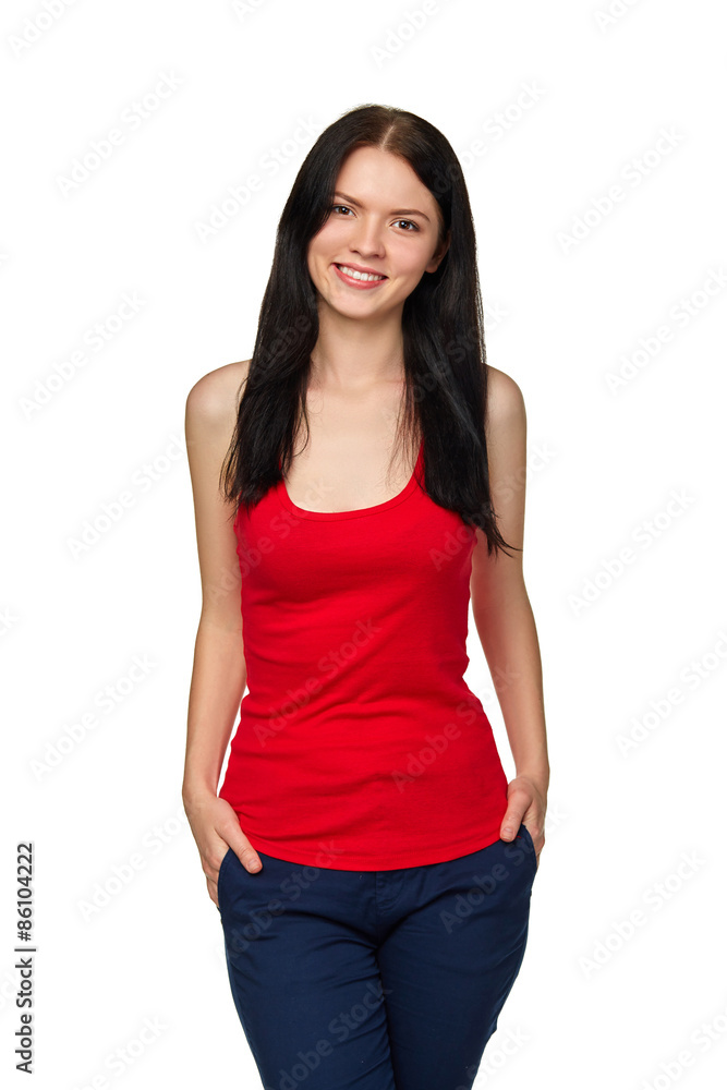 Smiling young slim tanned female crossed legs, isolated on white