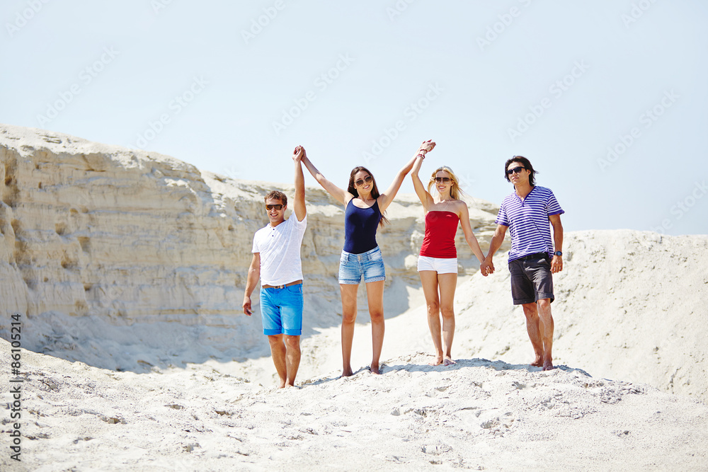 Friends on sand