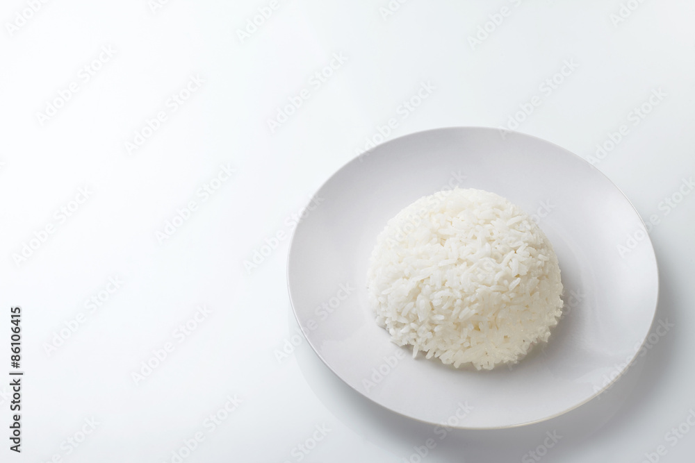 Rice on white plate isolated on white background