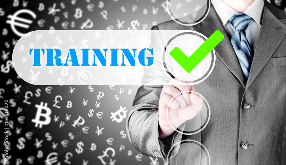 Businessman pressing touch screen interface training checkbox Businessman pressing touch screen interface training checkbox