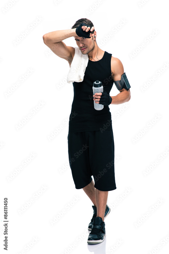 Tired sports man with towel and bottle with water