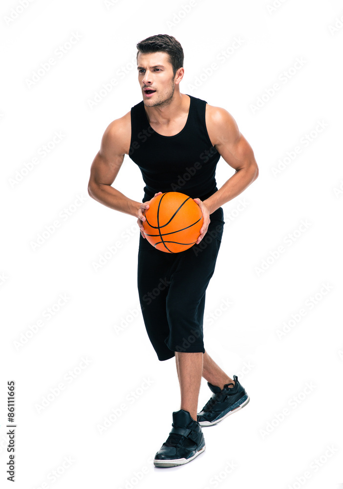 Full length portrait of a man playing in basketball Full length portrait of a man playing in basketball
