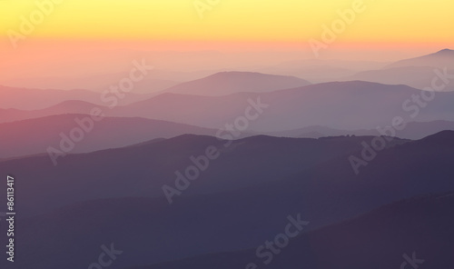 mountain peaks at sunset haze © pilat666