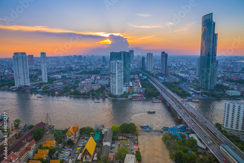 Landscape of river in Bangkok cityscape with sunset