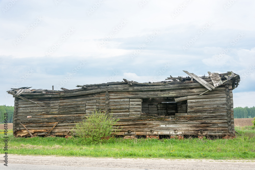 Destroyed log house. Destroyed log house.