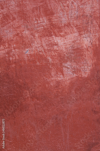 pattern on part of wall with red plaster