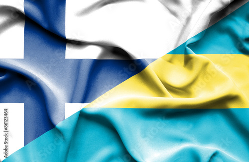 Waving flag of Bahamas and Finland