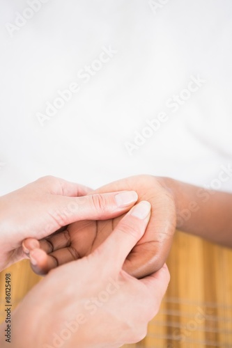 Wallpaper Mural A woman enjoying a hand massage Torontodigital.ca