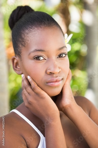 Tableau sur toile Beautiful young woman looking at camera