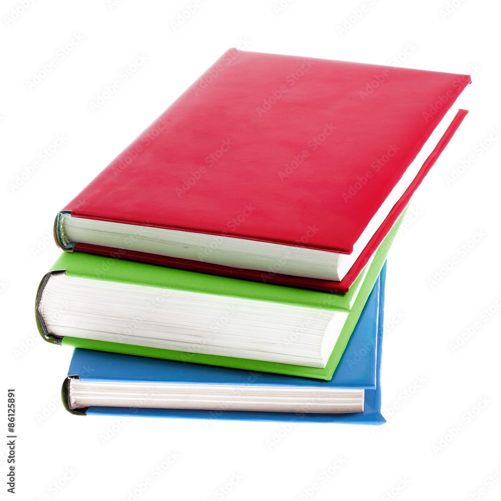 Several multicolored bright books isolated on white background Several multicolored bright books isolated on white background