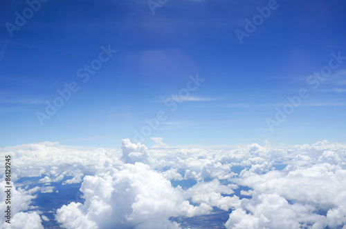 A view of sky, clouds photographed from an airplane.
