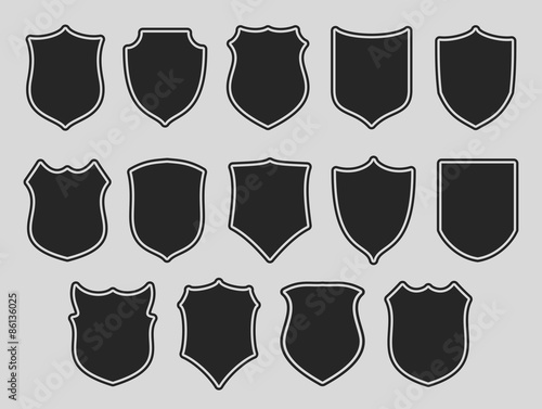 Set of shields over grey background