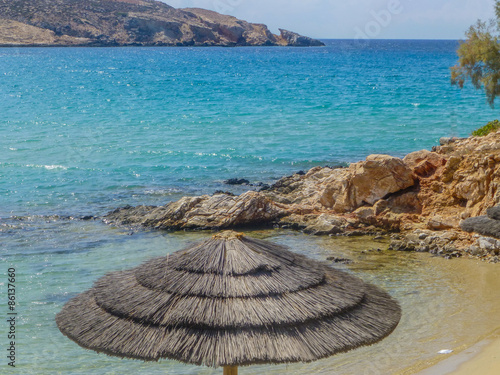 Umbrella on the beach Parasporos Cycladic island Paros. photo