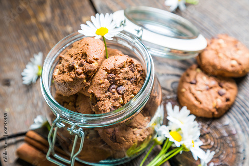 Fotobehang Chocolate cookies in a jar