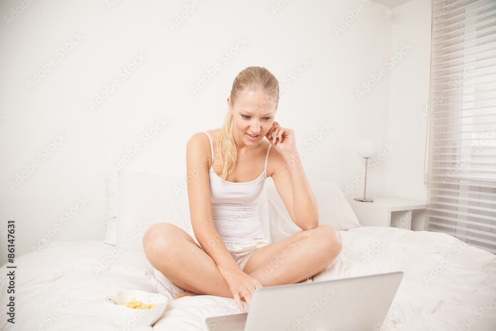 Woman looking at computer Woman looking at computer