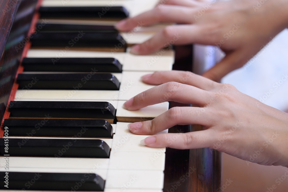 hands playing the classic wood piano hands playing the classic wood piano