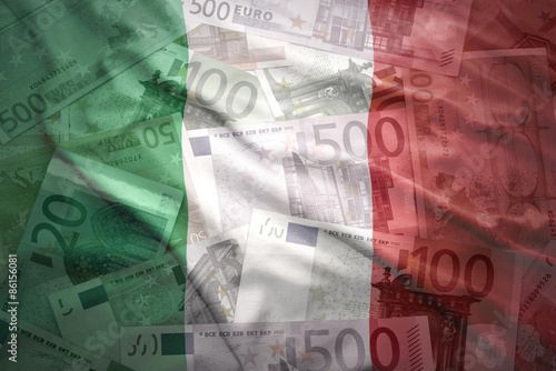 Fototapeta Naklejka Na Ścianę i Meble -  colorful waving italian flag on a euro money background