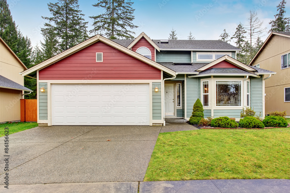 Classic house with garage and driveway. Classic house with garage and driveway.